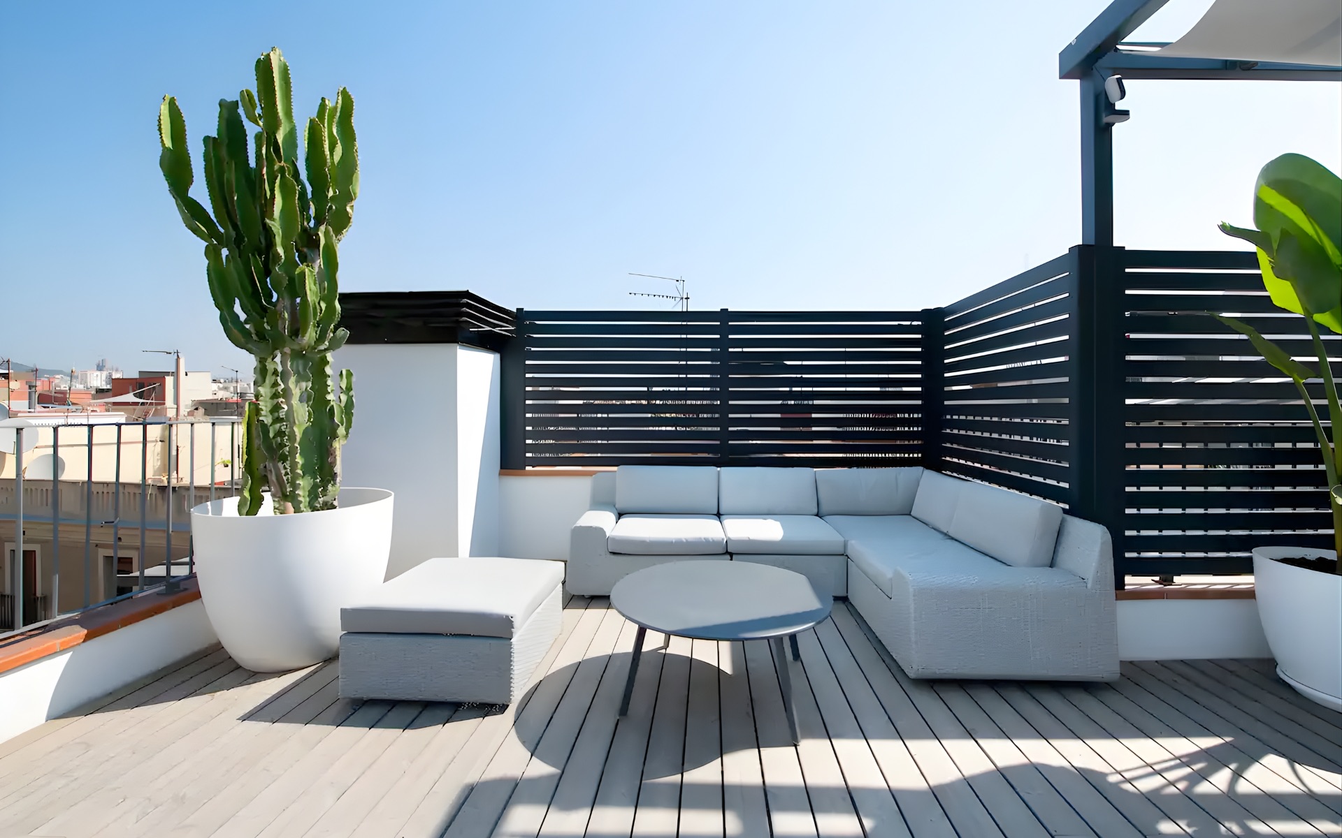 Private rooftop terrace of a luxury 2-bedroom Bizflats serviced apartment in El Born, Barcelona